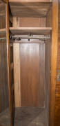 An Australian Arts & Crafts wardrobe, fiddleback blackwood with copper strap hinges and fine repouss&eacute; panels, circa 1900, 230cm high, 216cm wide, 71cm deep - 12