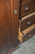 A fine Colonial Beaconsfield gentleman's wardrobe with inverted breakfront, Australian cedar with huon pine secondary timbers and blackwood knobs, Tasmanian origin, circa 1850. Bearing label on the back "A. JONES, LAUNCESTON". 203cm high, 220cm wide, 70cm - 9