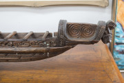 A Maori miniature canoe, carved wood and paua shell, New Zealand, 20th century, 101cm long - 6