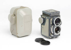 ROLLEI-WERKE FRANKE & HEIDECKE (Germany): Rolleiflex Grey Baby, 1957-63 small, grey-bodied TLR [#2019708] with Xenar f3.5 60mm lens; with caps and in maker's grey leather & plastic ERC.
