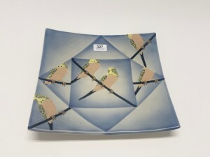 An art pottery budgie plate, circa 1980 by 'Lorraine Lee' from the 'Jam Factory', a student of renowned potter 'Geoff Minchin'. 31cm wide