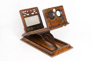 ROWSELL (England): Rowsell's Patent Graphoscope, c1875, walnut-veneered body, with a pair of sliding viewing lenses and plaque inscribed "ROWSELL'S PATENT GRAPHOSCOPE", and an adjustable stereograph rest.