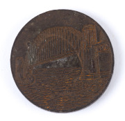 Medallions & Badges: SYDNEY HARBOUR BRIDGE STEEL RIVET MEDAL: struck on a planchet from a slice of surplus rivet manufactured by McPhersons, used in the construction of Sydney Harbour Bridge, 27mm diameter, weight 13.12gr, c.1932; G/VG.