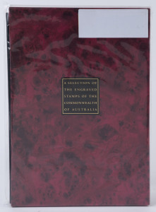 AUSTRALIA: General & Miscellaneous: 2003 "A Selection of the Engraved Stamps of the Commonwealth of Australia" comprising 32 reprinted die proofs in rose-red on archival paper, including 5/- & 10/- Robes and 2d Duke of Kent as Governor General proposed design, housed in original album with slipcase. Pristine condition. Retail $300+.