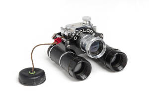 TOKO PHOTO CO. (Japan): Cyclops, c1950 16mm binocular camera with Telesigmar f4.5 35mm lens. Both film cassettes present.