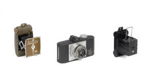 UNIVERSAL CAMERA CORP. (U.S.A.): Univex Model A, c1933, tiny black plastic camera for No.00 rollfilm; a Univex Model AF, 1935, compact collapsing vest-pocket camera (in olive green) for No.00 follfilm;also, a Universal Iris, c1938 heavy cast-metal camera 