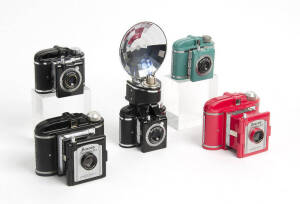 WHITEHOUSE (U.S.A.): Beacon Two-twenty-five, c1950-58 plastic coloured cameras in red, and black for 620 rollfilm, with matching maker's ERCs. Also, a Beacon (black), a Beacon-II in green (with ERC) and a Beacon-II with flash synchronizer and ERC. (5 came
