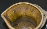 MERRIC BOYD pottery jug with windswept branch handle and painted decoration, incised "Merric Boyd, 1930", 16.5cm high, 17cm wide - 16