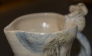 MERRIC BOYD pottery jug with hand-painted rural scene and two applied koalas perched on the branch handle, incised "Merric Boyd, 1941", 14cm high, 15cm wide - 13