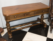 ANDREW LENEHAN Colonial Australian cedar hall table with two drawers and double turned stretcher base, Sydney, New South Wales, mid 19th century. Bearing original circular paper label "A. Lenehan's Cabinet and Upholstery Establishment, 179 Castlereagh Str - 3