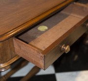 ANDREW LENEHAN Colonial Australian cedar hall table with two drawers and double turned stretcher base, Sydney, New South Wales, mid 19th century. Bearing original circular paper label "A. Lenehan's Cabinet and Upholstery Establishment, 179 Castlereagh Str - 8