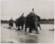 THE UNION OF BURMA: A collection of large-format black & white silver gelatin photographs, each with the violet handstamp of the Office of Instruction verso, circa 1950s, all approx. 37 x 29cm or 29 x 37cm. (27 items). Images include working elephants, m - 3