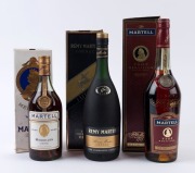 COGNACS: Martell Médaillon. V.S.O.P. Cognac, France, 700 ml. (1970s bottle & box); also, a 1 Litre bottle (1990s; with box); and Remy Martin Fine Champagne Cognac, 1 Litre bottle with box). Total: 3 bottles.