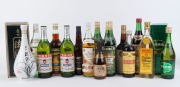 Various Rums, Vermouths, Pernod, a Mezcal, various Asian wines, ports, etc. (Total: 16 bottles).