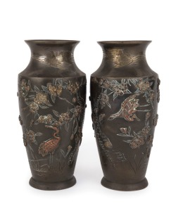 A pair of Japanese bronze vases with copper and gold highlights, Meiji Period, 17.5cm high