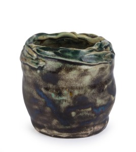 F.E. COX early pottery vase with applied gum leaves, incised "FORTUNE WELLS POTTERY, VIC. F.E.C. 1933", 8cm high, 8cm wide