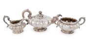 A Georgian sterling silver three piece tea service by Edward, Edward Jnr., John & William Barnard of London, circa 1831, the teapot 16cm high, 29cm wide, 1410 grams total