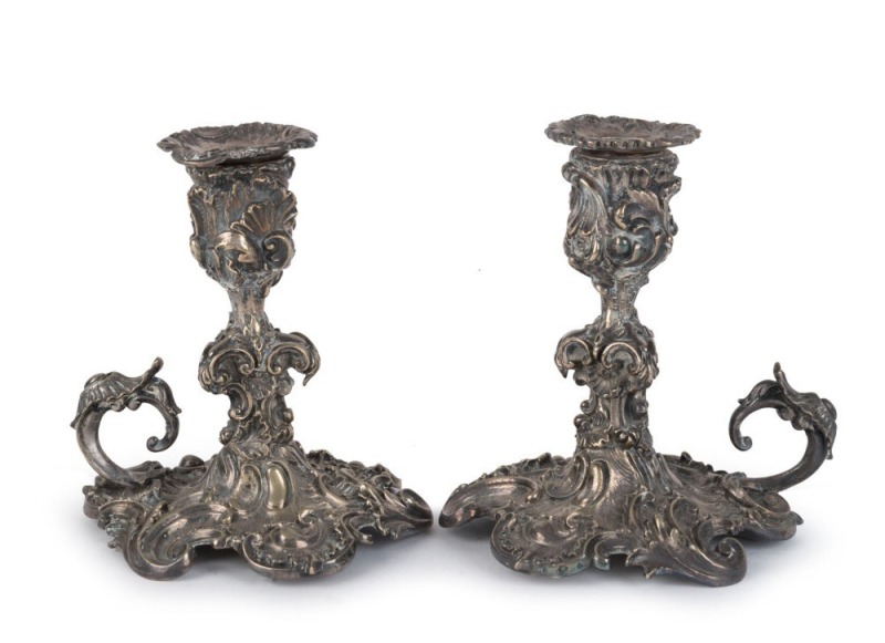 A pair of Rococo style silver plated chamber sticks, 19th century, ​​​​​​​12.5cm high