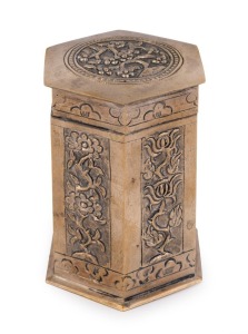 An antique Chinese silver tea caddy of hexagonal form adorned with embossed foliate and floral panels, late Qing Dynasty, circa 1900, 9.5cm high, 122 grams
