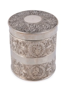 An antique Indian silver tea caddy of cylindrical form with scrolling foliate decoration, 19th century, maker's mark to base, ​8.5cm high, 7.5cm diameter, 110 grams