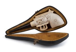 An antique Meerschaum pipe carved into the form of a revolver, in original fitted case, 19th century, ​19cm long
