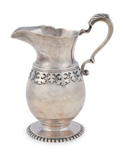 An English sterling silver jug with applied floral decoration, by Wakely & Wheeler of London, circa 1901, ​13cm high, 172 grams