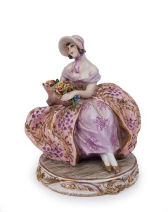 GUIDO CACCIAPUOTI (1892-1953), Italian porcelain statue of a seated lady, early to mid 20th century, incised signature "Cacciapuoti", with remains of original paper label, 18cm high