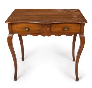 An antique French provincial Louis XV style two drawer desk, fruitwood and pine with peg joint construction, 19th century, 74cm high, 83cm wide, 59cm deep