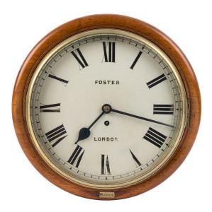 An antique English station clock, fusee movement in mahogany case with Roman numerals, circa 1880. Dial signed "FOSTER, LONDON", pendulum and plaque stamped "1165", ​40cm diameter