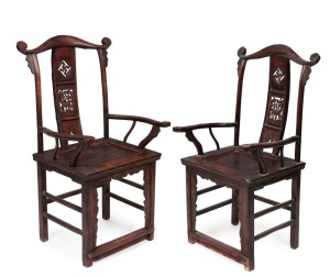 A pair of antique Chinese chairs with yoke backs and carved splats, 18th/19th century, 117cm high, 63cm across the arms