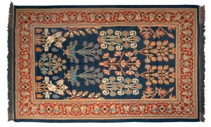 A Persian hand-woven floral patterned rug with blue ground, ​215 x 145cm