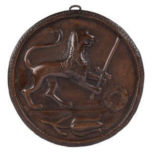 An early Italian copper heraldic roundel, 17th/18th century, 25cm diameter. PROVENANCE: The Jason E. Sprague Collection, Melbourne.