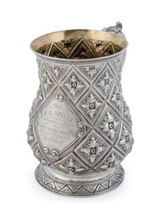 An antique sterling silver presentation mug by Henry Holland of London, circa 1862. Inscribed "To W. H. SMITH, Testimonial Of Esteem From Tenant Farmers, Tradesmen And Working People In Putley, 1864", 13cm high, 254 grams