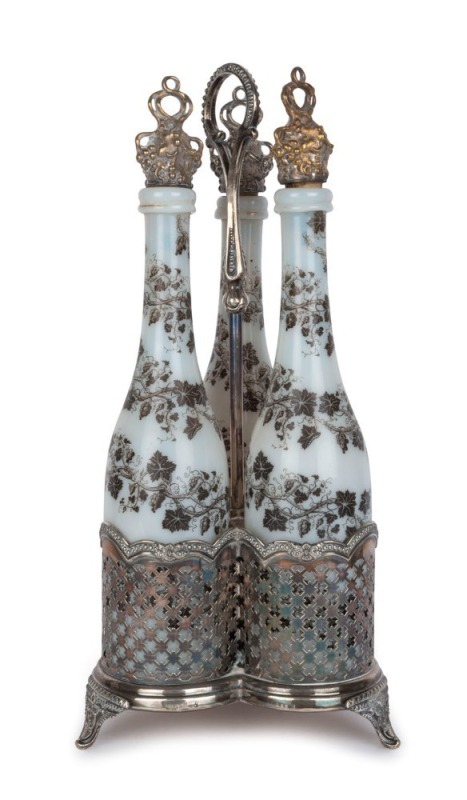 An antique silver plated three bottle decanter stand with set of three matching milk glass decanters, 19th century, ​43cm high