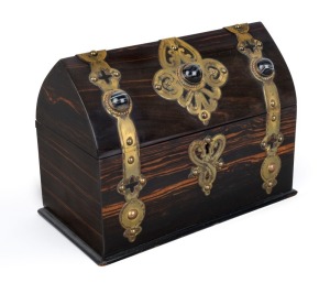 An antique gothic jewellery casket, coromandel and brass inset with cabochon agates, interior lined in blue silk, mid 19th century, 18cm high, 25cm wide, 13.5cm deep