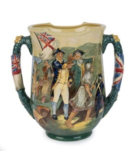 ROYAL DOULTON "Captain Cook" loving cup by Charles Noke, numbered 14/350, with "Scroll Of Fame", factory mark to base, 25cm high, 25cm wide.