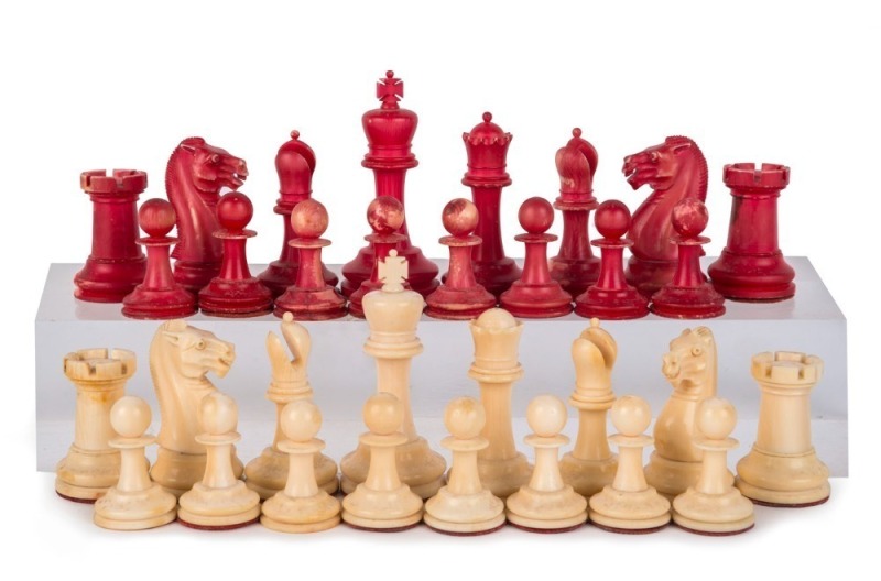 STAUNTON antique chess set, carved and stained ivory, 19th century, ​the kings 7.75cm high