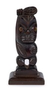 Maori warrior statue, carved wood with paua shell eyes, New Zealand origin, early 20th century, ​15.5cm high