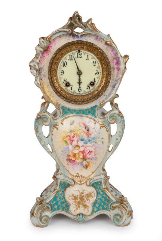 An antique mantel clock, German hand-painted porcelain case with Ansonia time and strike movement, late 19th century, ​42cm high