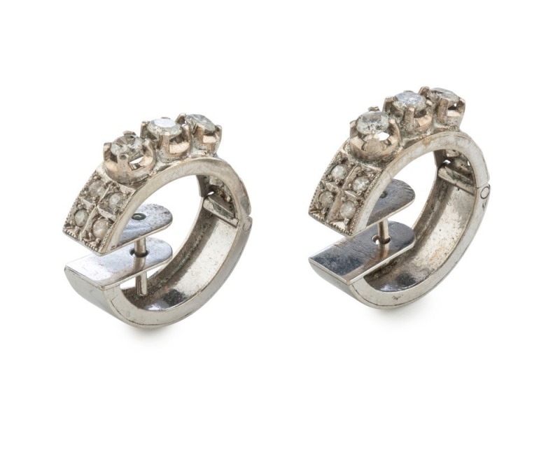 A pair of vintage white gold earrings set with brilliant cut white diamonds, circa 1970, ​1.8cm wide, 5.75 grams total