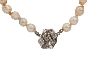 A vintage pearl necklace with 18ct white gold and diamond clasp, ​48cm long