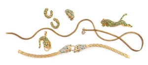 A stunning 14ct gold jewellery set made in homage to the Duchess of Windsor, set with emeralds, diamonds and rubies, comprising a bracelet, ring, brooch, pair of earrings and matching pendant (plus unassociated chain), stamped "14K", the brooch 5.5 cm lon