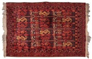 An Afghan hand-knotted wool rug with burgundy background, 150 x 106cm