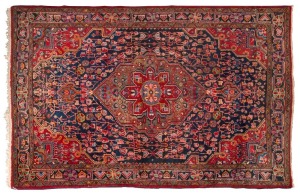 An Afghan brown, green and red hand-knotted wool rug, ​​​​​​​218 x 144cm 