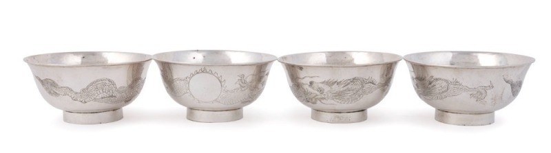 Four Chinese silver bowls with dragon decoration, 19th century, double seal marks to the bases, ​​​​​​​5cm high, 10.5cm diameter, 374 grams total