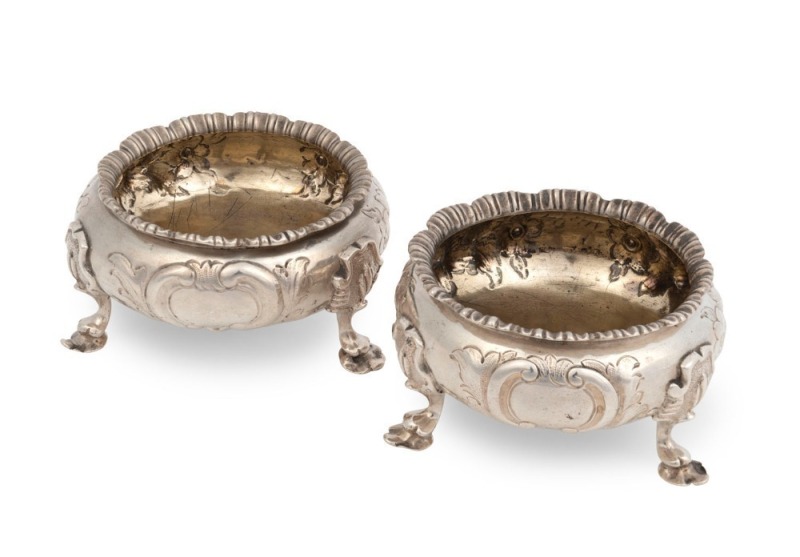 A pair of English sterling silver salt cellars by Charles Rawlings of London, circa 1851, ​​​​​​​4cm high, 9cm wide, 200 grams total