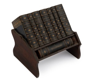 ASPREY REFERENCE LIBRARY set of eight books bound in full morocco with embossed gilt decoration housed in original fitted walnut stand, early 20th century, the stand 21cm wide