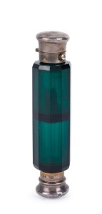 An antique double ended green glass scent bottle with silver tops, made in London, circa 1872, 12cm long
