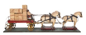 A folk art pull-along horse and dray toy, early 20th century, 50cm high, 150cm wide, 32cm deep