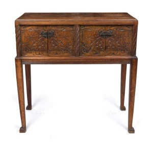An unusual antique four door side cabinet with carved timber panels, 19th century, 89cm high, 89cm wide, 39cm deep